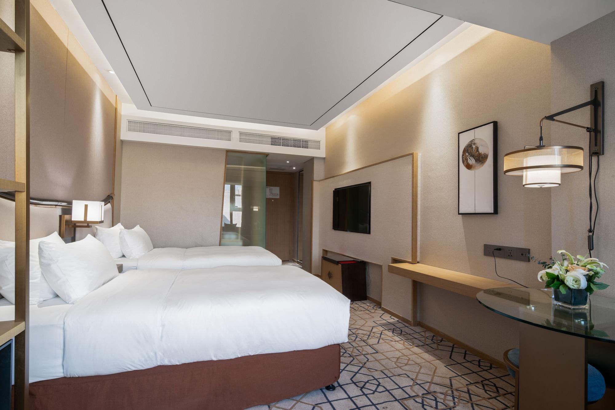 צ'נגדו Minshan Lhasa Grand Hotel מראה חיצוני תמונה